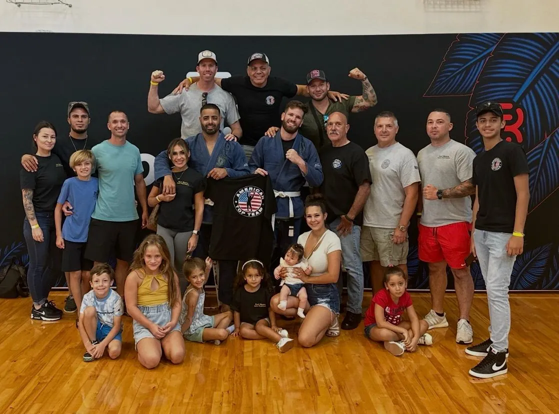 Brazilian Jiu-Jitsu families and kids team photo at the academy serving Cape Coral and Fort Myers students