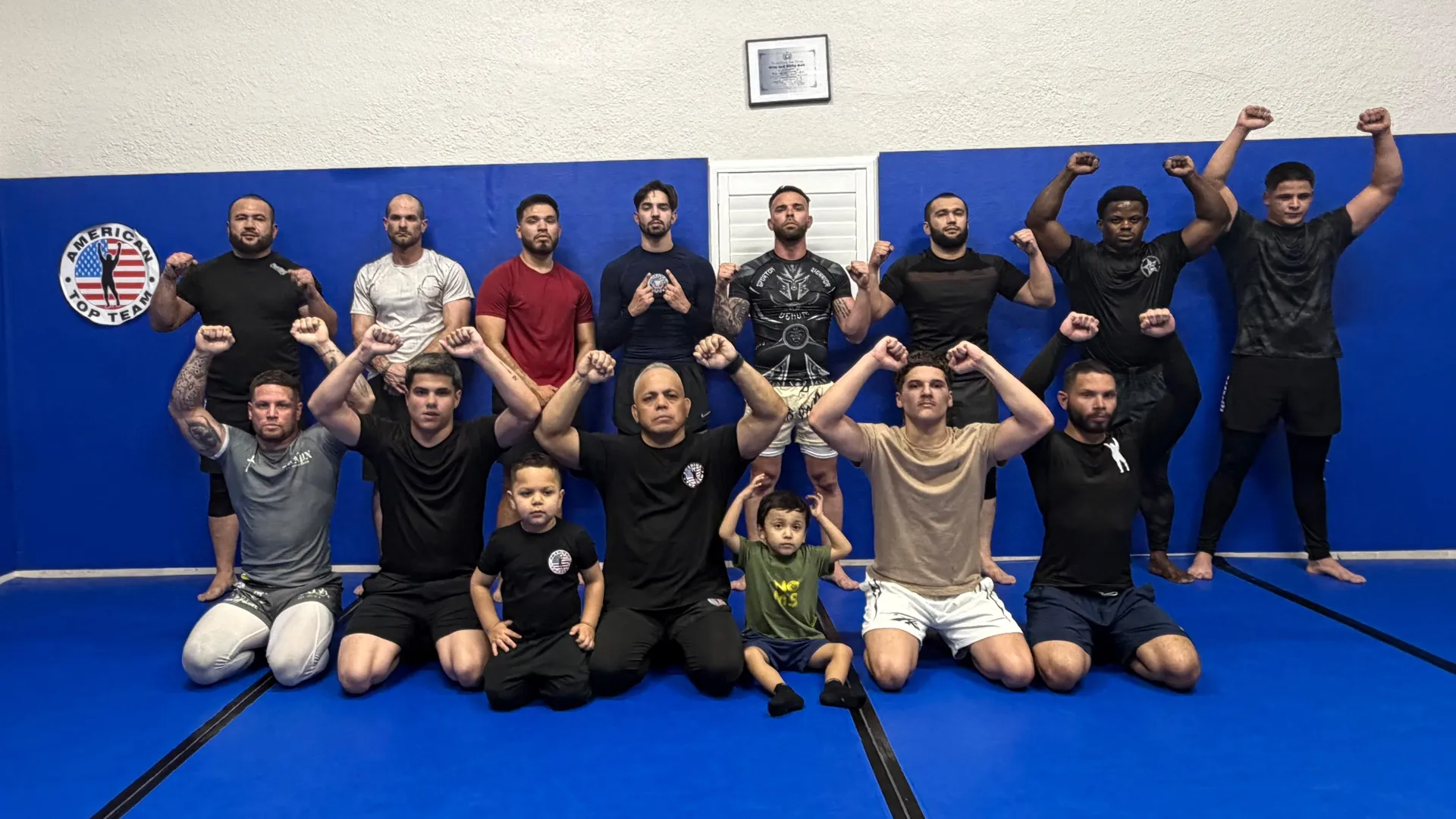 Team Hardoy grappling team raising their arms together after a Brazilian Jiu-Jitsu training session in Fort Myers, FL